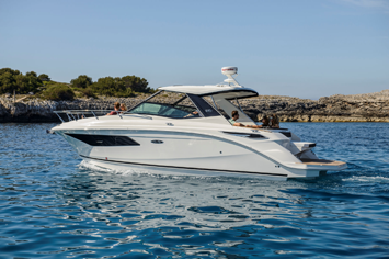 a white boat on the water